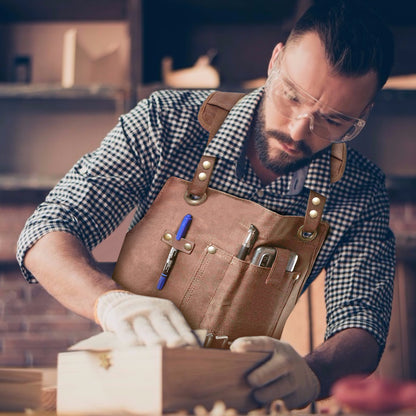 MAHAND woodworking apron made of durable wood-themed fabric, with adjustable straps and multiple tool pockets for houseware projects.